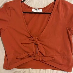 Cropped short sleeve top with two ties